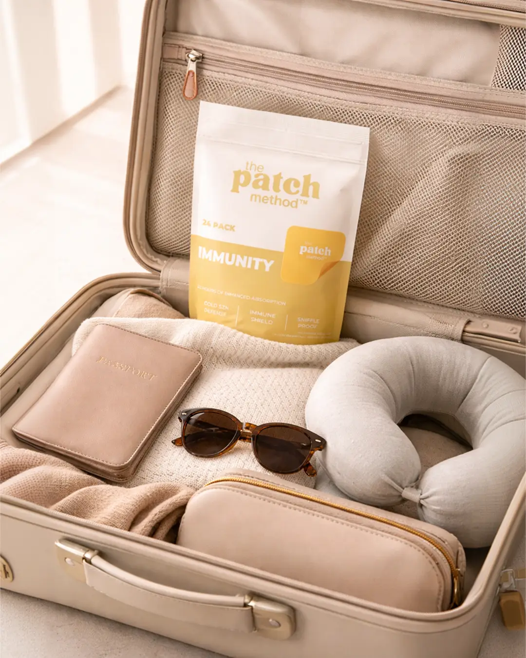 Patch Method immunity pack inside a travel suitcase